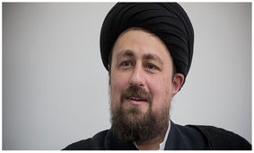 عکسی از سیدحسن خمینی و پسرش پای صندوق رای 