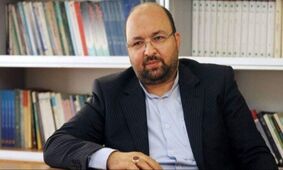 انتقاد تند جواد امام از تجمع غیر قانونی علیه روحانی و ظریف
